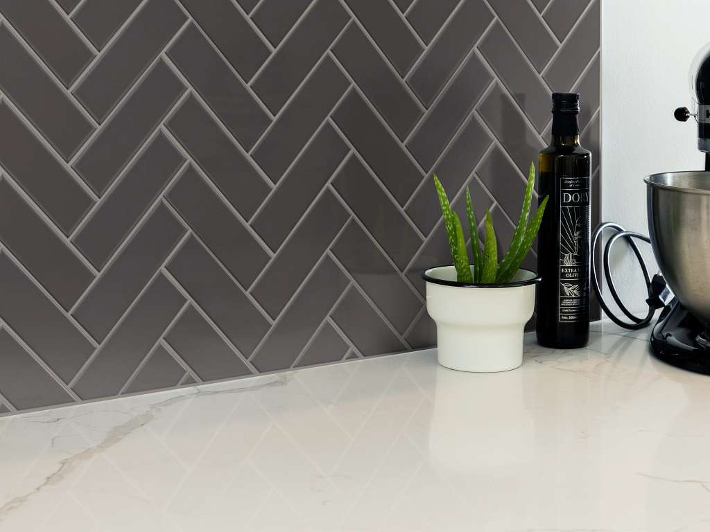 Grandeur Herringbone Gloss Tile & Stone - Carbon Room Scene Image