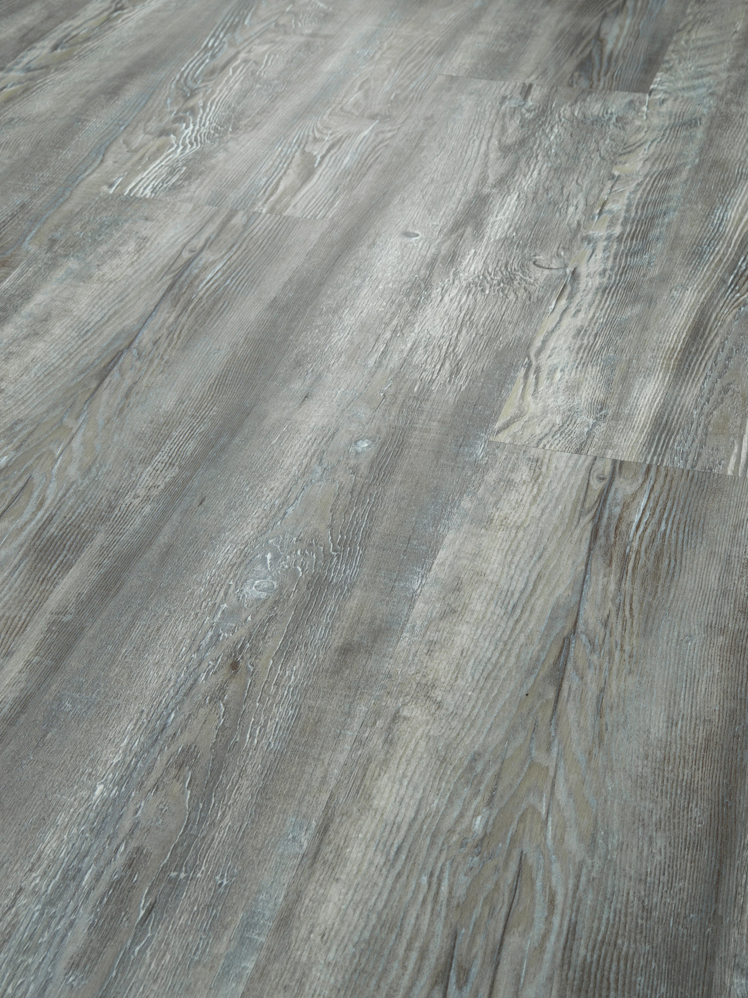 Vinyl Flooring Product Shot: Grey Wood Grain with Blue Accents