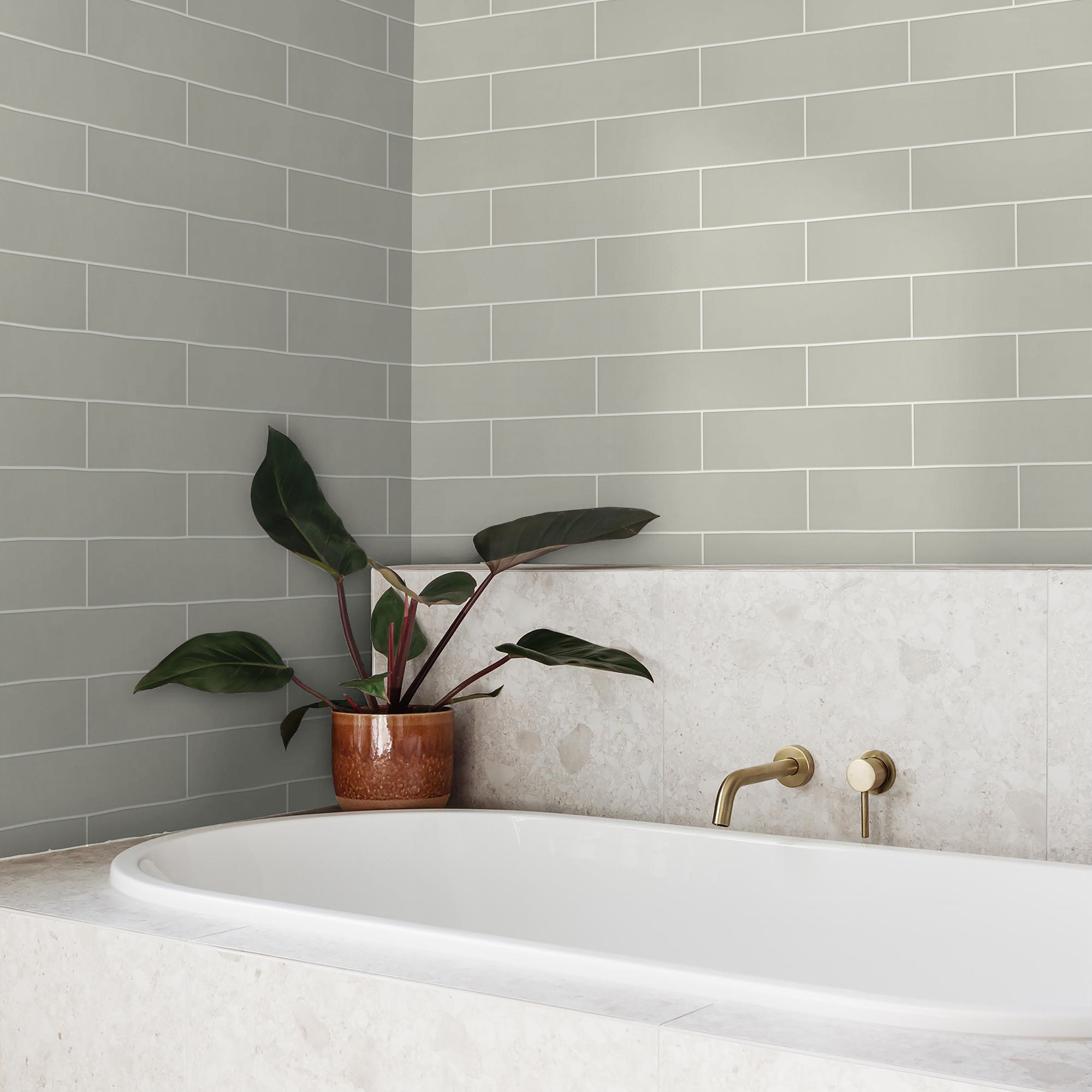 Beautiful kitchen with light green tile on the backaplash.